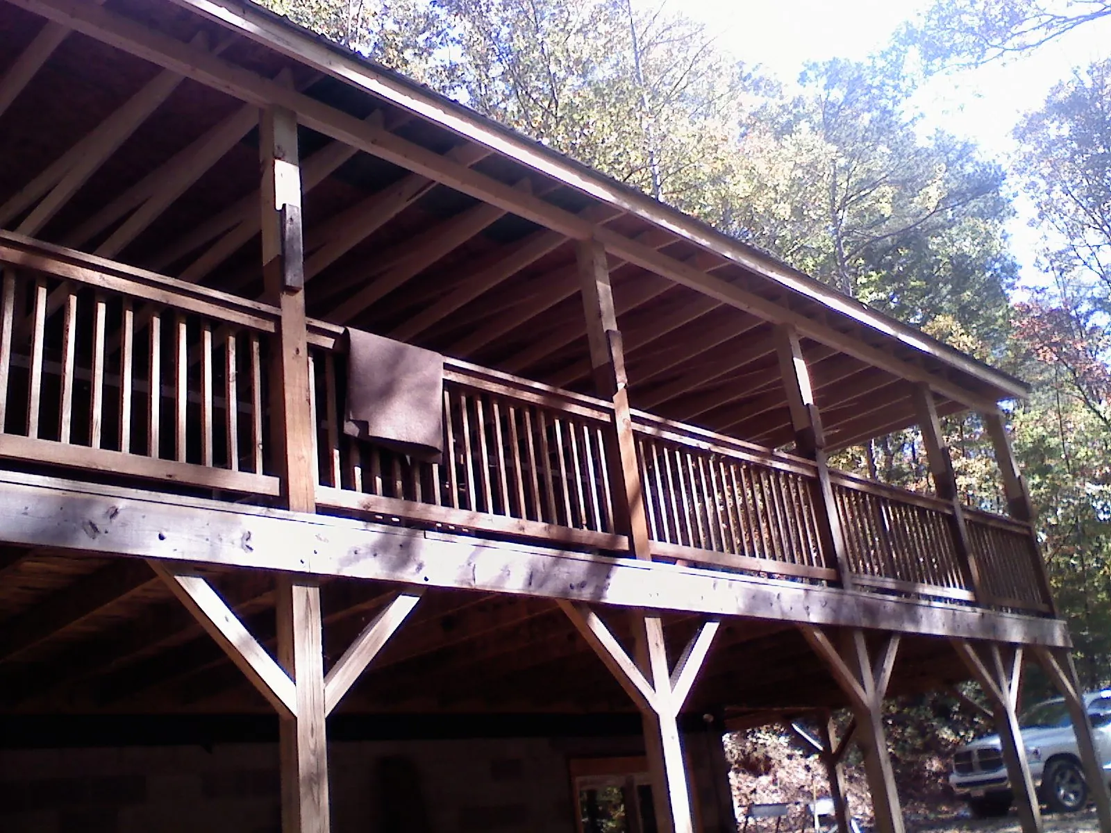 Timber framing under a new elevated porch and deck — Roof Leak Repair in Eastham by Roofing Brothers